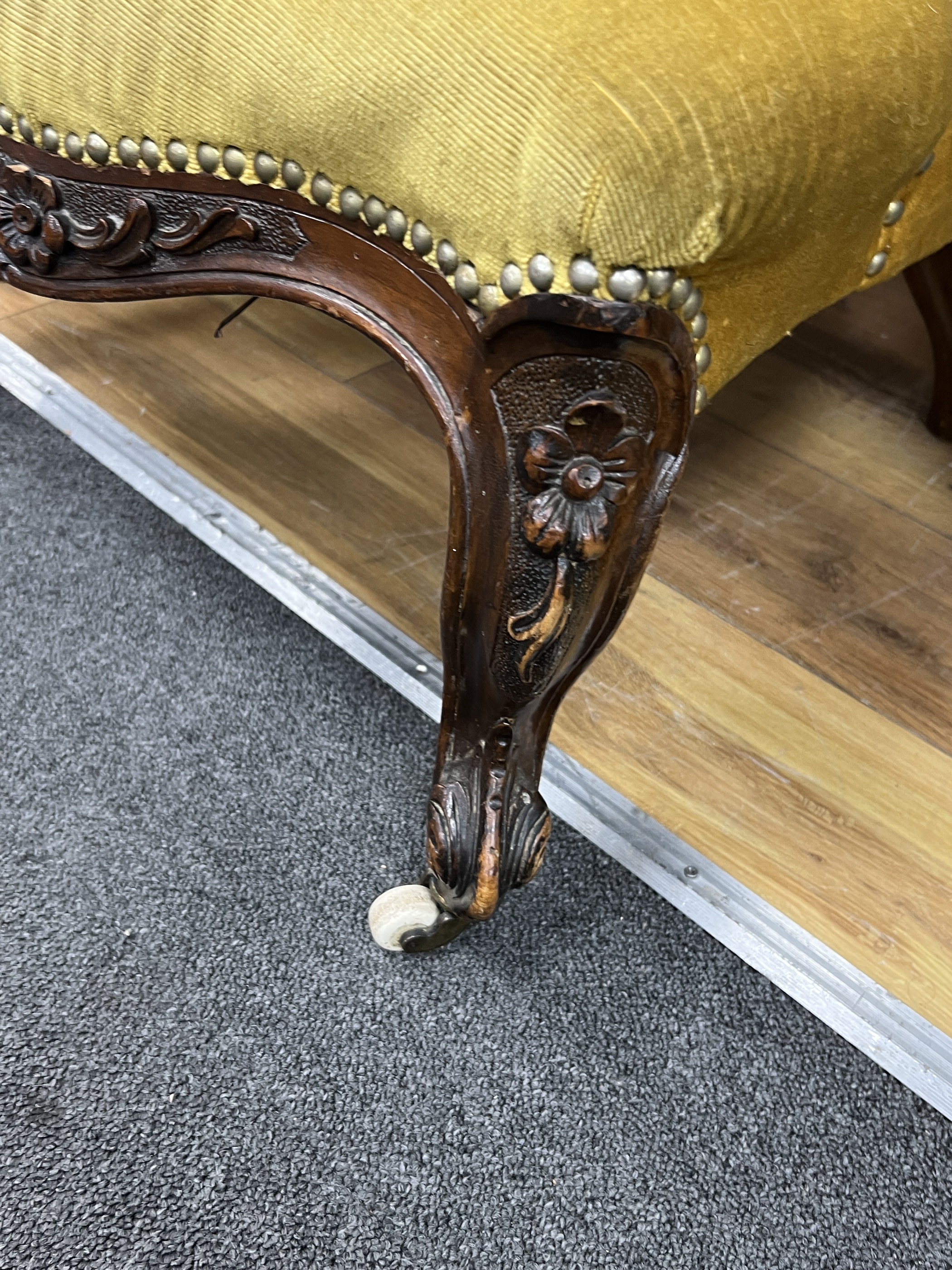A Victorian spoonback nursing chair, width 50cm, depth 70cm, height 70cm